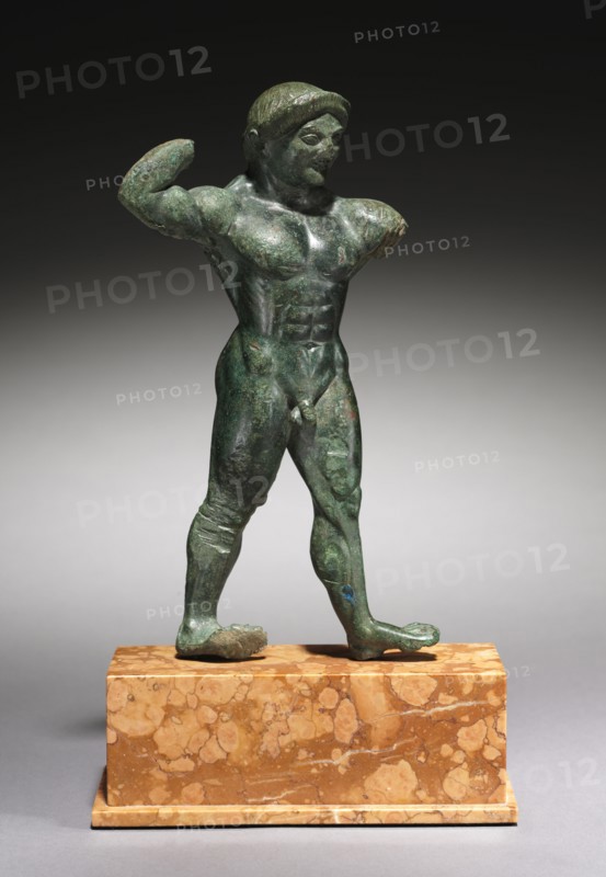 Statuette of an Athlete, 510-500 BC. Greece, Peloponnesus, late archaic - early classical period. Bronze (solid cast); overall: 21.5 cm (8 7/16 in.).