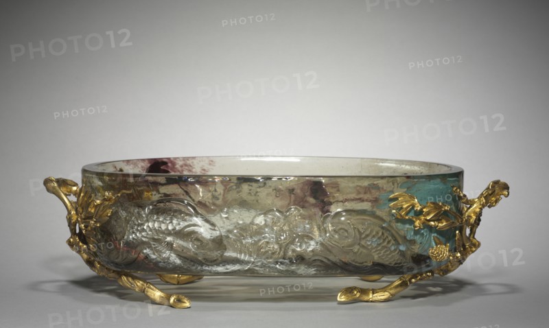 Centerpiece, c. 1880. Eugène Rousseau (French, 1827-1891), firm of Appert Frères (French), firm of Escalier de Cristal (French). Glass with gilt metal mounts; overall: 13.3 x 48 x 28.2 cm (5 1/4 x 18 7/8 x 11 1/8 in.).
