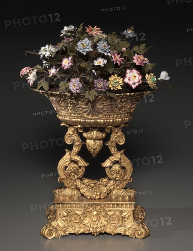 Centerpiece, or Jardinière, c. 1830-1850. France, Paris, 19th century. Gilt bronze with enamel flowers; overall: 36.7 x 31 x 17.5 cm (14 7/16 x 12 3/16 x 6 7/8 in.); with flowers: 51 x 38.2 x 26.4 cm (20 1/16 x 15 1/16 x 10 3/8 in.).