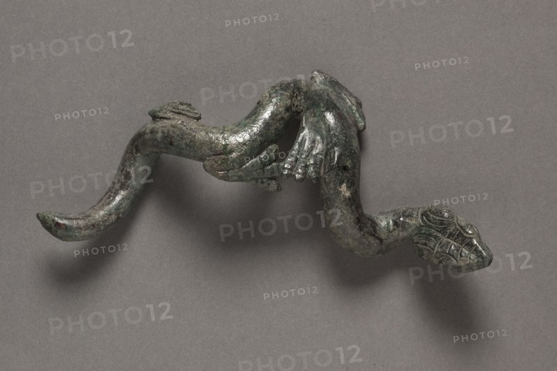 Apollo the Python-Slayer, c. 350 BC. Attributed to Praxiteles (Greek, c. 400BC-c. 330BC). Bronze, copper and stone inlay; overall: 14.8 x 9.4 x 3.6 cm (5 13/16 x 3 11/16 x 1 7/16 in.).