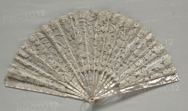 Lace Fan, c. 1860. Belgium, 19th century. Brussels bobbin lace; linen; frame: mother-of-pearl and ivory; overall: 30.5 x 50.8 x 3.2 cm (12 x 20 x 1 1/4 in.)