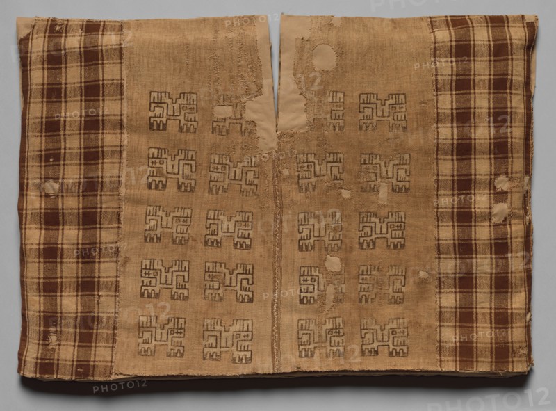 Tunic with Profile Animals and Checkerboards, 700 BC-AD 650. Peru, South Coast, Paracas or Nasca? (700 BC-AD 650). Cotton; dye-patterned plain-weave; overall: 72.4 x 104.1 cm (28 1/2 x 41 in.)