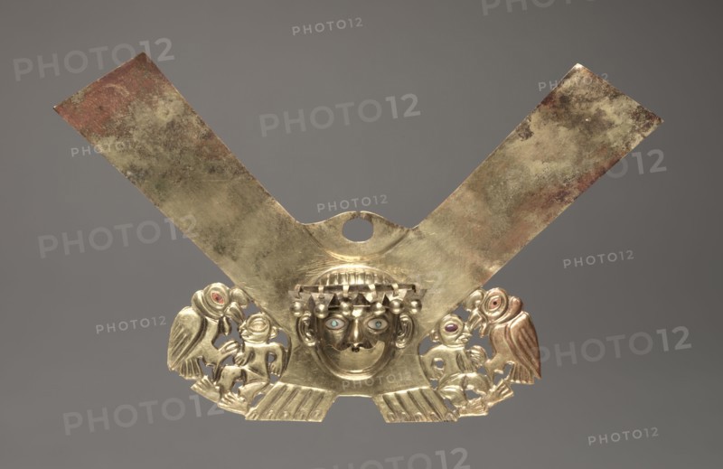 Nose Ornament with Human Head and Condors Attacking Humans, c. 100-300. Peru, North Coast, Moche culture (50-800), Early Intermediate Period (AD 0-700). Gold alloy; overall: 9.5 x 16.5 x 1.6 cm (3 3/4 x 6 1/2 x 5/8 in.).