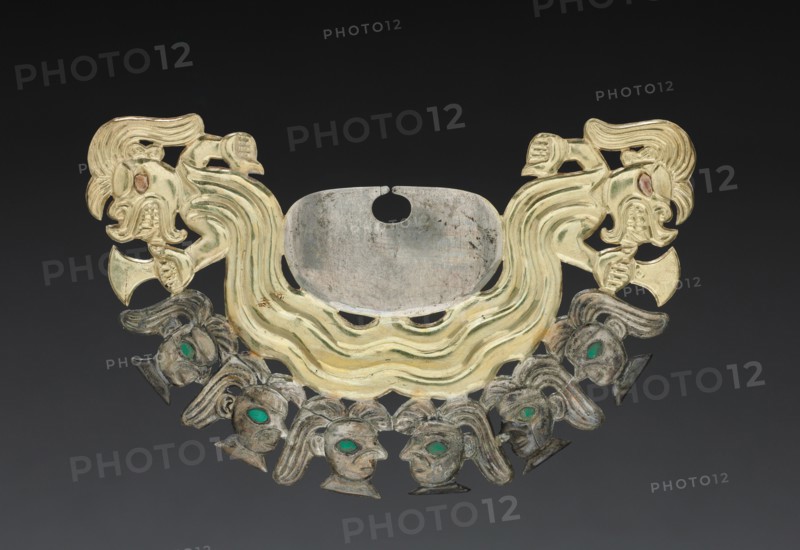 Nose Ornament with Decapitators and Human Heads, c. 100-300. Peru, North Coast, Moche culture (50-800), Early Intermediate Period (AD 0-700). Gold alloy and silver; overall: 8.8 x 14 cm (3 7/16 x 5 1/2 in.).