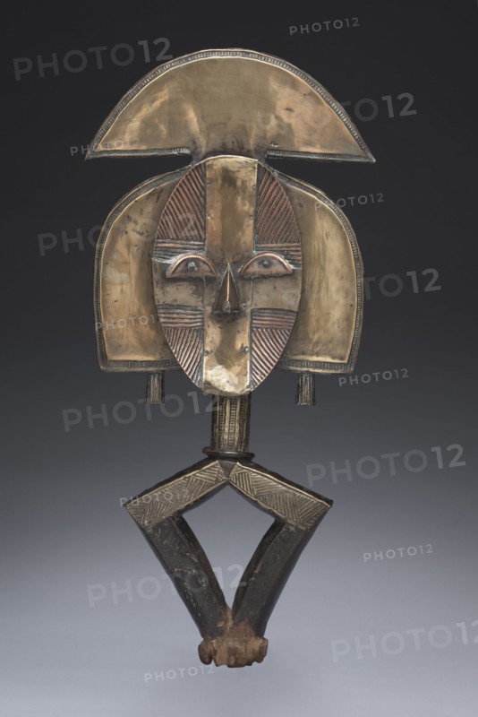 Reliquary Guardian Figure, probably 1800s. Equatorial Africa, Gabon, Kota, probably 19th century. Wood, metal; overall: 61 x 27.5 x 3 cm (24 x 10 13/16 x 1 3/16 in.)