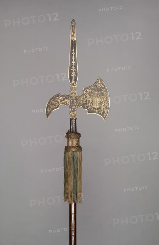 Parade Halberd (from the bodyguard of Ludwig Rudolf, Duke of Brunswick- Wolfenbüttel [1671-1735]), 1717. Germany, 18th century. Blued, etched and gilded steel, wooden haft with orginal steel base spike, silk tassel with alternating blue and gold bands; overall: 276.9 cm (109 in.)