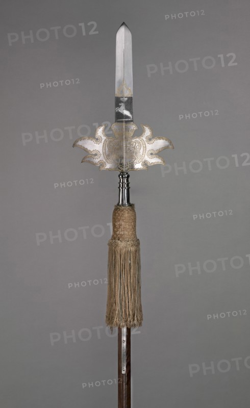 Parade Partisan (from the Bodyguard of August Wilhelm, Duke of Brunswick- Wolfenbüttel [1662-1731]), 1718. Germany, 18th century. Blued, etched and gilded steel, wooden haft with orginal steel base spike, silk tassel with alternating blue and gold bands; overall: 258.5 cm (101 3/4 in.)