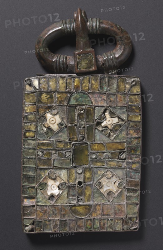 Belt Buckle, c. 525-560. Visigothic, Iberian Peninsula, Migration period, 6th century. Bronze and glass; overall: 14.1 x 8 x 1.4 cm (5 9/16 x 3 1/8 x 9/16 in.)
