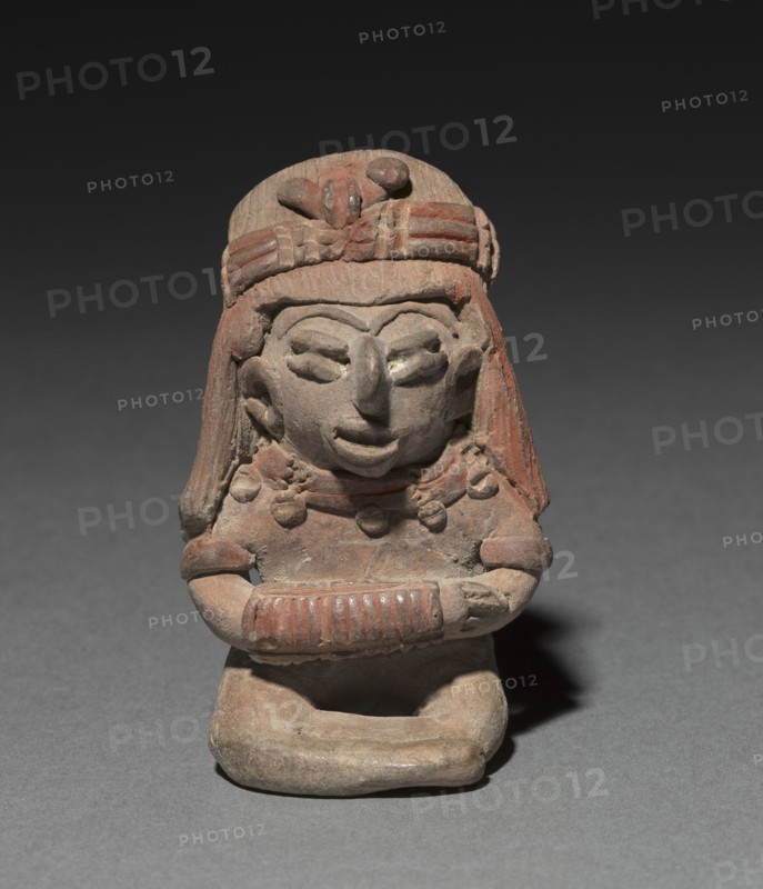 Seated Figurine Wearing a Bracelet, 300 B.C. to A.D. 300. West Mexico, Michoacán or Guanajuato state, Chupícuaro culture, 300 B.C-A.D. 300. Ceramic and pigment; overall: 7.2 x 4.4 cm (2 13/16 x 1 3/4 in.)