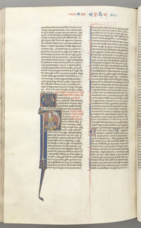 Fol. 450v, Ephesians, historiated initial P, Paul seated with a sword, the bust of God above, c. 1275-1300. Southern France, Toulouse(?), 13th century. Bound illuminated manuscript in Latin; brown morocco binding; ink, tempera and gold on vellum; 533 leaves