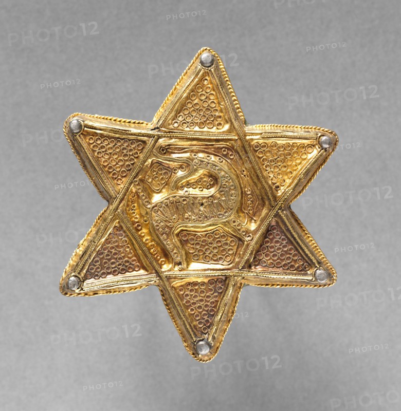 Brooch in the Form of a Six-Pointed Star, late 700s-early 800s. Frankish, early Carolingian, late 8th century - early 9th century. Gold with repoussé and filigree decoration; copper backplate; diameter: 7.7 cm (3 1/16 in.)