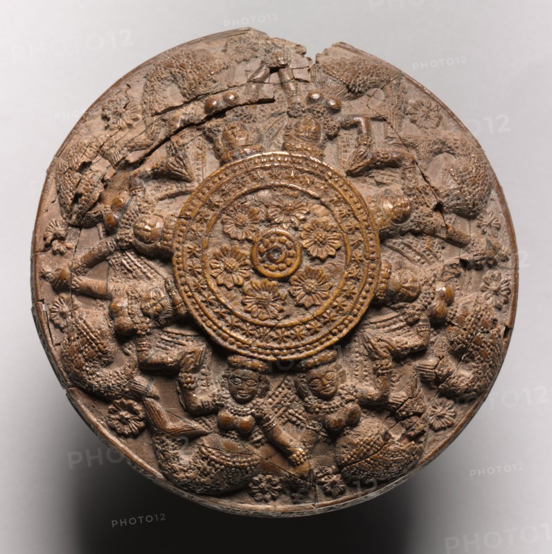 Roundel with Mermaids and Lotus, 200 - 1 BC. India, Chandraketugarh area, Shunga period, 2nd-1st century BC. Ivory; diameter: 10.5 cm (4 1/8 in.); overall: 2.5 cm (1 in.).