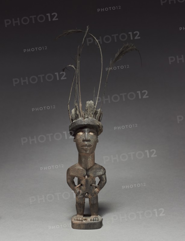 Figurine, late 1800s-early 1900s. Central Africa, Republic of the Congo, Kongo people. Wood and various other materials; overall: 29.5 x 12 x 16 cm (11 5/8 x 4 3/4 x 6 5/16 in.)