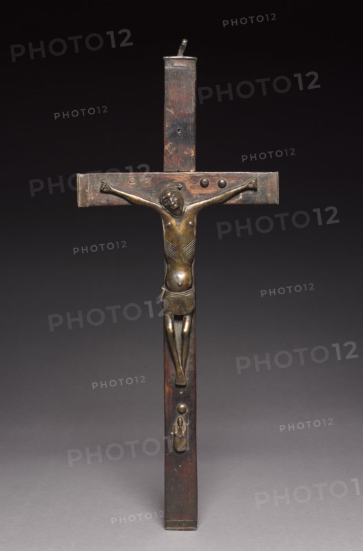 Crucifix, late 1800s-early 1900s. Central Africa, Democratic Republic of the Congo or Cabinda, Kongo people. Brass, iron alloy, wood; overall: 44.7 x 22.2 x 3.2 cm (17 5/8 x 8 3/4 x 1 1/4 in.)