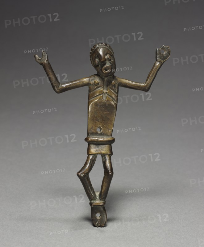 Corpus (Crucified Christ), late 1800s-early 1900s. Central Africa, Democratic Republic of the Congo or Cabinda, Kongo people. Brass; overall: 16.5 x 12.5 x 2.5 cm (6 1/2 x 4 15/16 x 1 in.)