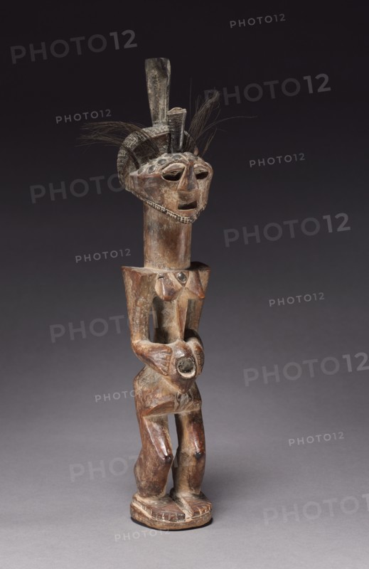 Female Figure, late 1800s-early 1900s. Africa, Democratic Republic of the Congo, Songye people. Wood, brass, animal hair, antelope tusk; overall: 34.8 x 6.2 x 14.5 cm (13 11/16 x 2 7/16 x 5 11/16 in.)