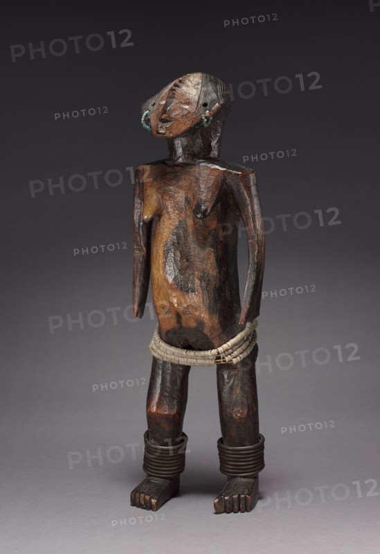 Female Figure of a Pair, late 1800s-early 1900s. Central Africa, Democratic Republic of the Congo, Ngbandi people. Wood, copper, glass beads, iron, fabric; overall: 41 x 13 x 11.5 cm (16 1/8 x 5 1/8 x 4 1/2 in.)