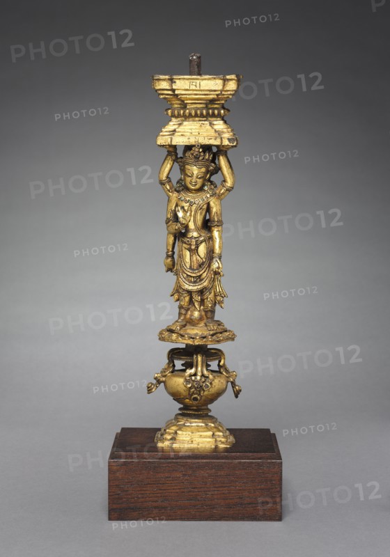 Support with Addorsed Figures, 1400s. Tibet, Densatil Monastery, 15th century. Gilt bronze; overall: 33.5 x 9.5 x 8 cm (13 3/16 x 3 3/4 x 3 1/8 in.).