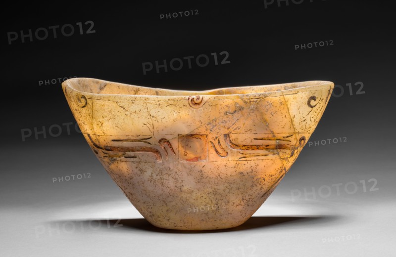 Carved Bowl, 1200-300 BC. Mesoamerica, reportedly the Tepecoacuilco River Valley, Guerrero, Olmec style (1200-300 BC), Formative Period. Stone (travertine); overall: 13.3 x 23.5 x 10.2 cm (5 1/4 x 9 1/4 x 4 in.).