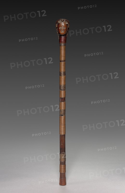 Scepter, late 1800s or early 1900s. Ovimbundu people, Angola, Central Africa, Africa, late 19th or early 20th century. Wood, metal, brass, fiber; overall: 57.5 x 4.5 x 5.5 cm (22 5/8 x 1 3/4 x 2 3/16 in.)