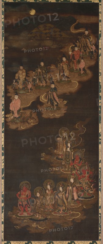 Descent of the Nine Luminaries and the Seven Stars at Kasuga, 1300s. Japan, Nanbokucho period (1336-1392), 1336-1392. Hanging scroll; ink, color, gold and cut gold on silk; mounted: 184.5 x 58.5 cm (72 5/8 x 23 1/16 in.); painting only: 106 x 42 cm (41 3/4 x 16 9/16 in.); with knobs: 184.5 x 63.5 cm (72 5/8 x 25 in.).