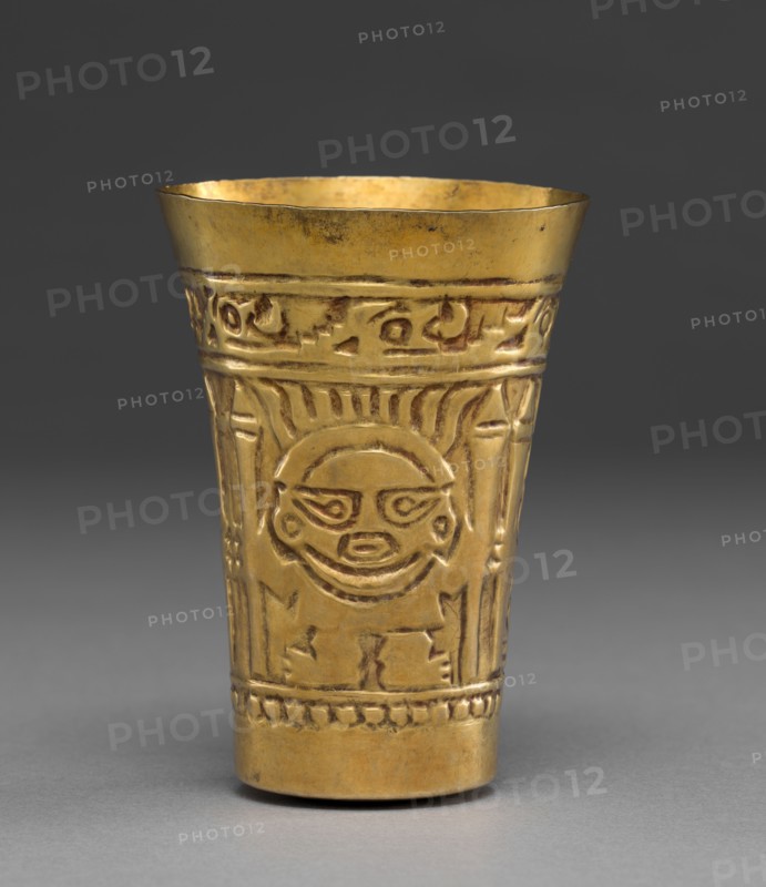 Beaker with Frontal Figures, 900-1100. Central Andes (Peru), Lambayeque (Sicán) people, 10th century-12th century. Gold, hammered; overall: 12.5 x 9.1 cm (4 15/16 x 3 9/16 in.).