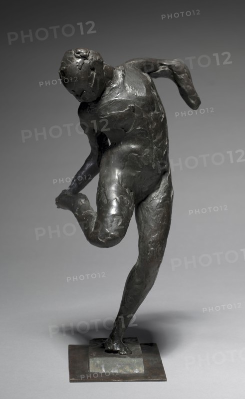 Dancer Looking at the Sole of her Right Foot, 1896-1897. Edgar Degas (French, 1834-1917). Bronze; overall: 46.4 x 21.6 x 20.3 cm (18 1/4 x 8 1/2 x 8 in.).