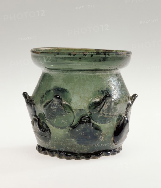 Prunted Beaker, Krautstrunk, Germany; 1480 - 1520; Free-blown dark green glass with applied decoration; 6.2 x 6.4 cm