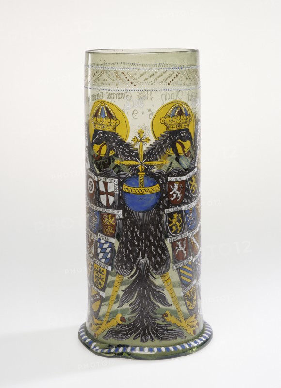Imperial Eagle Beaker; Central Germany, possibly, Germany; 1599; Free-blown colorless, greenish-brown, glass with gold leaf