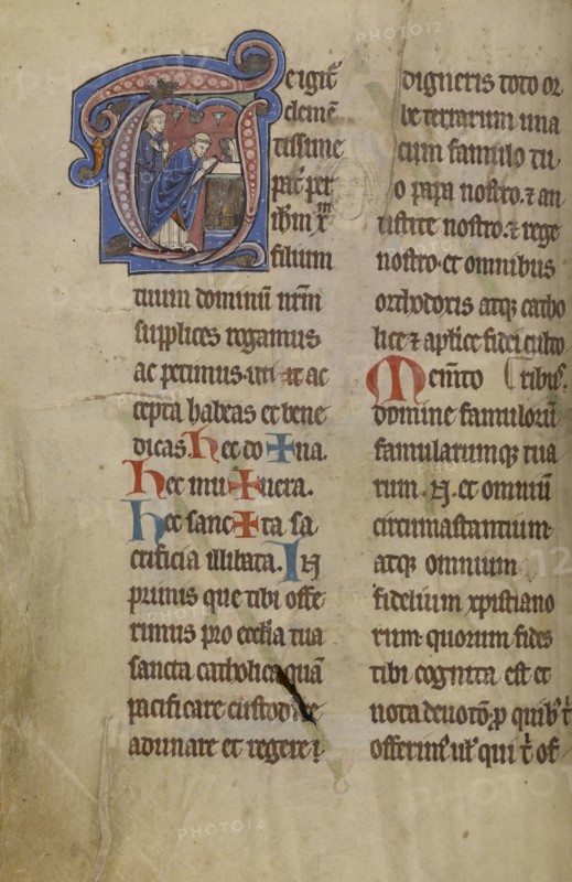 Initial T: A Priest Celebrating Mass; Lyon, France; begun after 1234 - completed before 1262; Tempera colors and gold leaf
