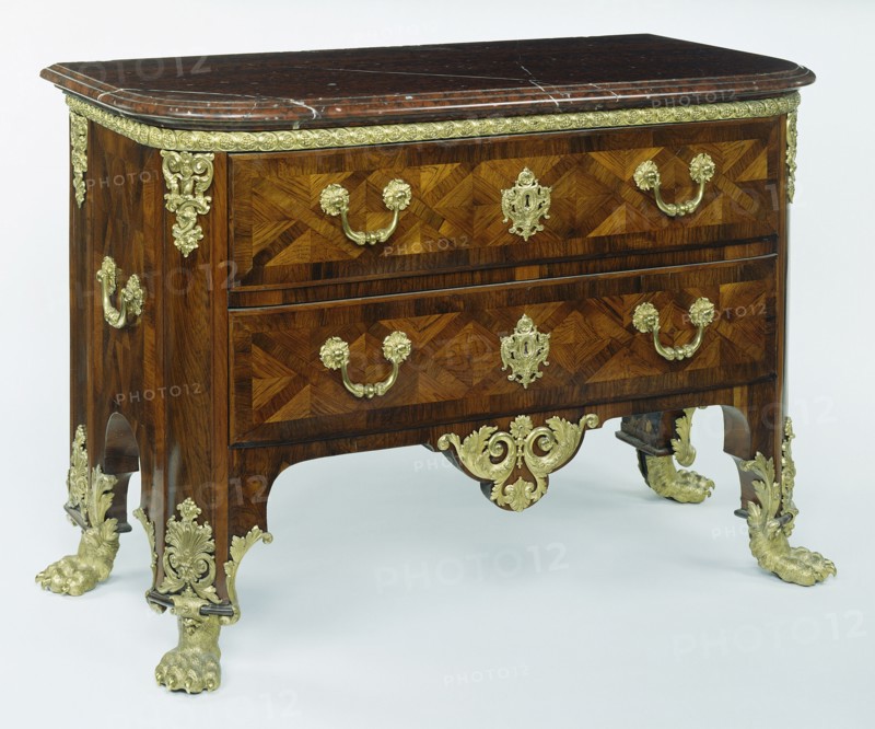 Commode; Paris, France; about 1710 - 1715; Fir and oak veneered with rosewood; drawers of walnut; gilt-bronze mounts; rouge
