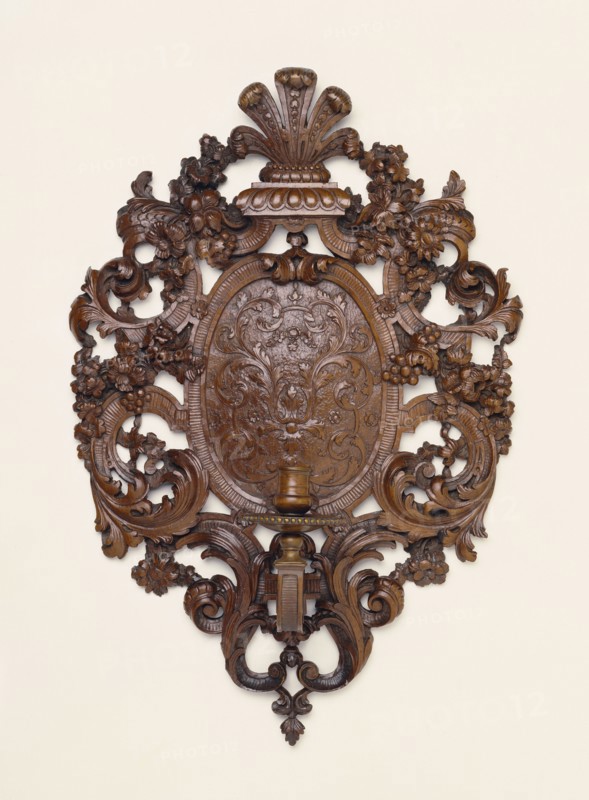 Wall Light; Nancy, Lorraine, France; about 1700; Carved fruitwood, perhaps bois de Sainte-Lucie, 43.2 x 29.5 x 12.7 cm