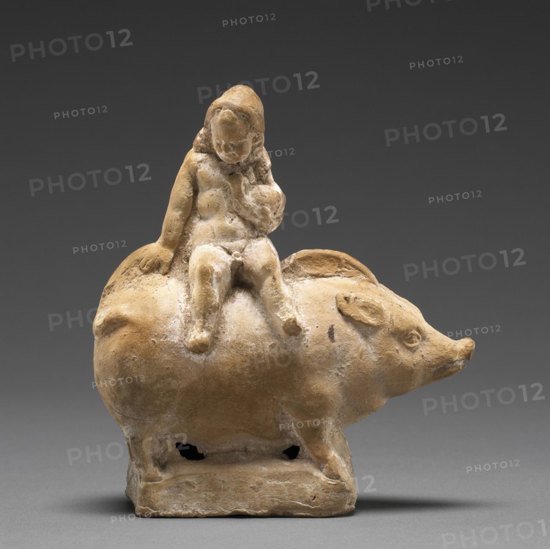 Rattle in the Shape of a Boy Sitting on a Pig; Rhodes, ?, Greece; 2nd - 1st century B.C; Terracotta with Polychromy; 12 × 10.6