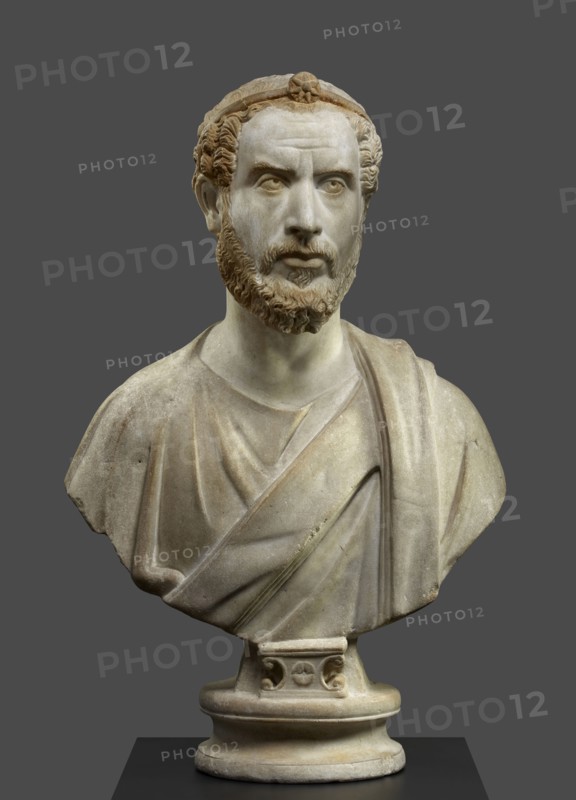 Portrait Bust of a Man, Perhaps a Priest of Serapis; Roman Empire; 180 - 220; Marble with polychromy and gilding; 79.5 × 49 × 27