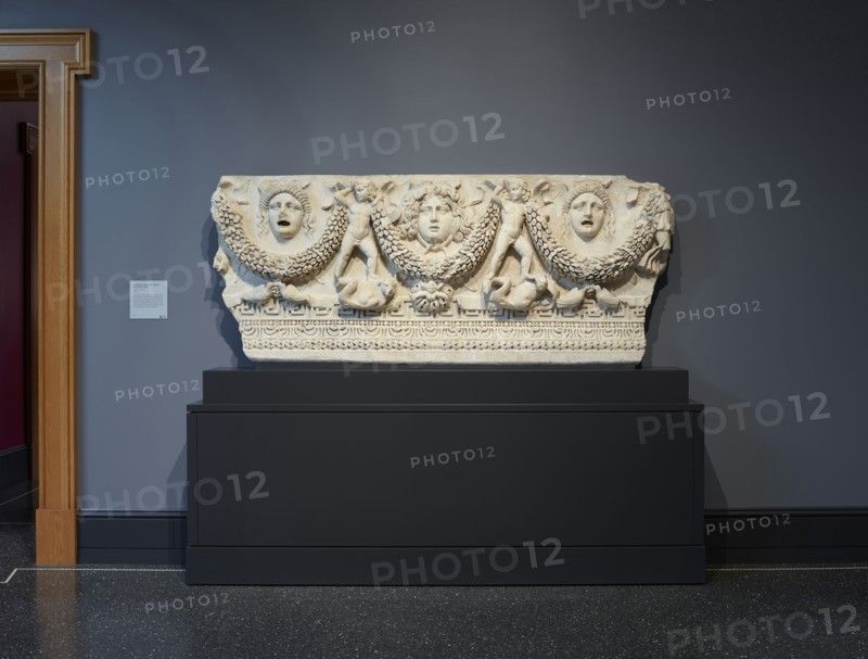 Front Panel of a Garland Sarcophagus; Roman Empire; about A.D. 140–170; Light gray marble, Phrygian marble, 91.5 × 226 × 18.5