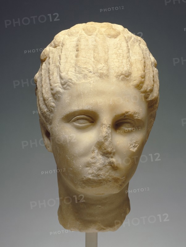 Head of a Woman; Greece; about 320 B.C; Marble; 30.5 × 18.2 × 23 cm, 12 × 7 3,16 × 9 1,16 in