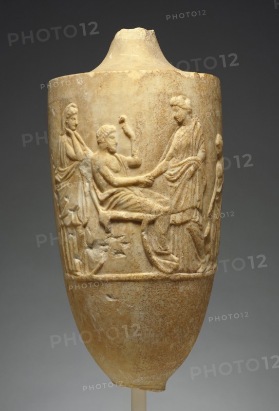 Sculpted Vessel with a Family Scene; Greece, Attica, about 360 B.C; Marble; 56.5 × 25.4 cm, 22 1,4 × 10 in
