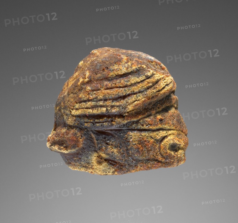 Pendant: Horse's Head in Profile; Italy; 500 - 400 B.C; Amber; 37 × 36 × 18.5 mm, 1 7,16 × 1 7,16 × 3,4 in