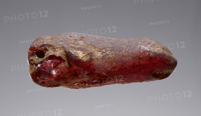 Pendant: Bovine Head; Italy; 500 - 400 B.C; Amber; 35 × 24 × 13 mm, 1 3,8 × 15,16 × 1,2 in