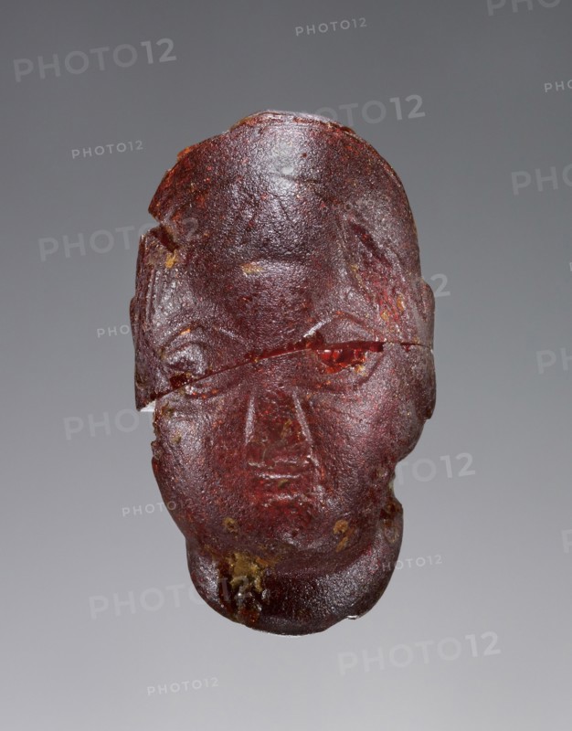 Pendant: Female Head; Italy; 500 - 480 B.C; Amber; 42 × 24 × 29 mm, 1 5,8 × 15,16 × 1 1,8 in