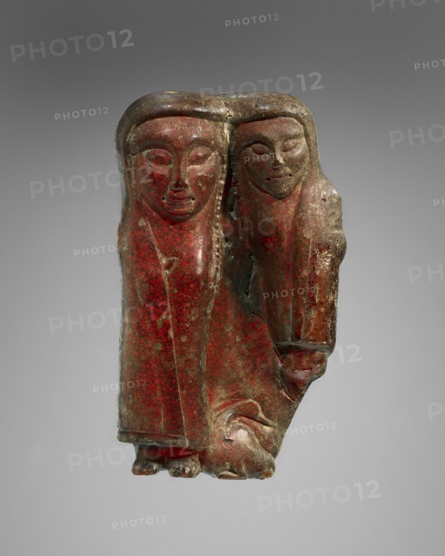 Pendant: Female Holding a Child, Kourotrophos, with Bird; Italy; 600 - 550 B.C; Amber; 83 × 50 × 50 mm, 3 1,4 × 1 15,16 × 1 15