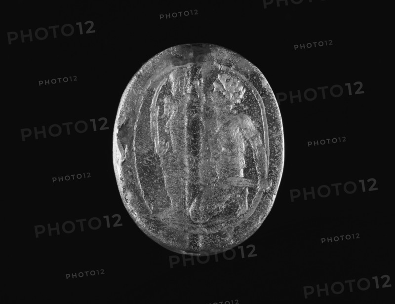 Scaraboid; Greece; late 5th century B.C; Pale green glass; 0.7 × 2.8 × 2.2 cm, 1,4 × 1 1,8 × 7,8 in