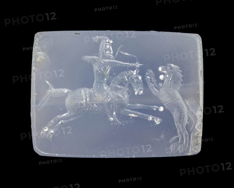 Engraved Tabloid Gem; Pendants Group; Asia Minor; about 400 B.C; Blue chalcedony; 1.1 × 1.4 × 1.9 cm, 7,16 × 9,16 × 3,4 in