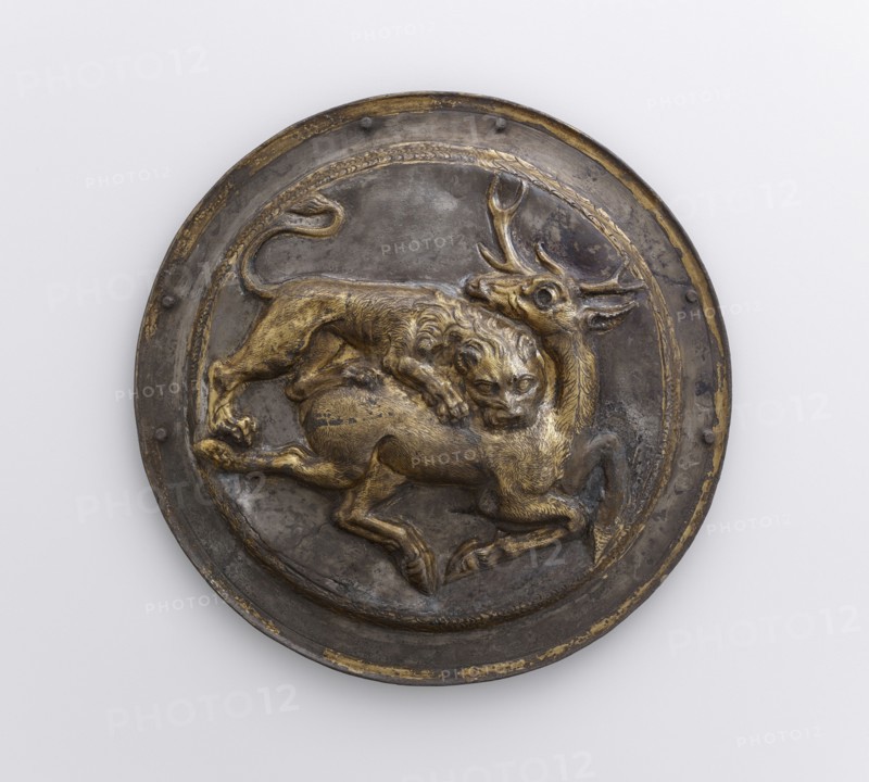 Phalera with Relief of Lion Attacking a Stag; Parthia; 2nd century B.C; Silver with gilding; 9 × 12.6 cm, 3 9,16 × 4 15,16 in