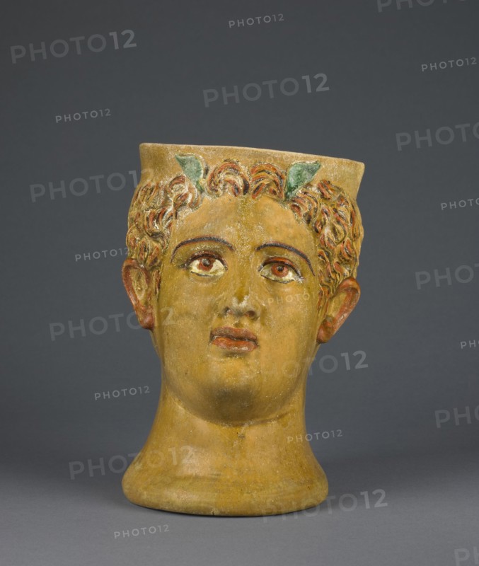 Mug Shaped as the Head of a God; Likinnios, Greek, active 100 - 1 B.C., Asia Minor; 1st century B.C; Terracotta; 19 × 12.2 cm