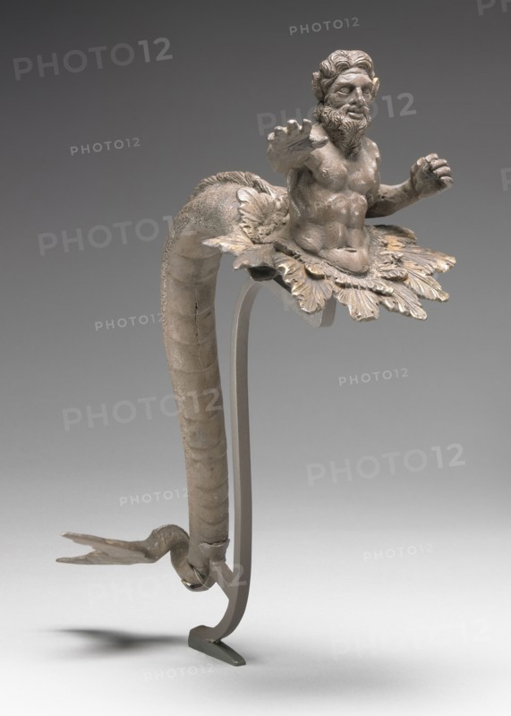 Handle in the Shape of Triton; Macedonia or Illyria, Magna Graecia; 100 - 50 B.C; Silver with gilding; 27 × 9.5 × 25 cm