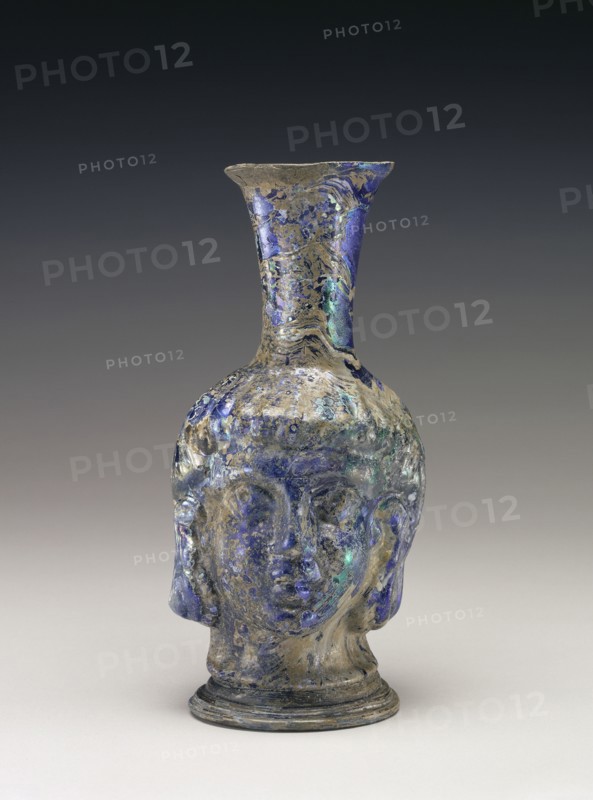 Flask in the Shape of a Head; Roman Empire; 4th - 5th century; Glass; 17.2 × 8 cm, 6 3,4 × 3 1,8 in