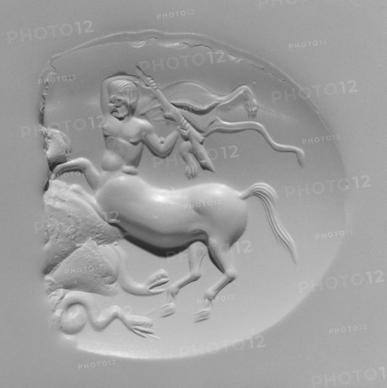Engraved Scaraboid; first quarter of 4th century B.C; Brown chalcedony; 4.2 × 3.8 × 1.3 cm, 1 5,8 × 1 1,2 × 1,2 in