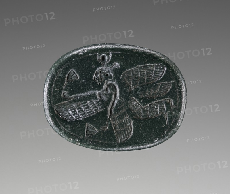 Engraved Scarab; 500 - 450 B.C; Green jasper; 1.5 × 1.1 × 0.9 cm, 9,16 × 7,16 × 5,16 in