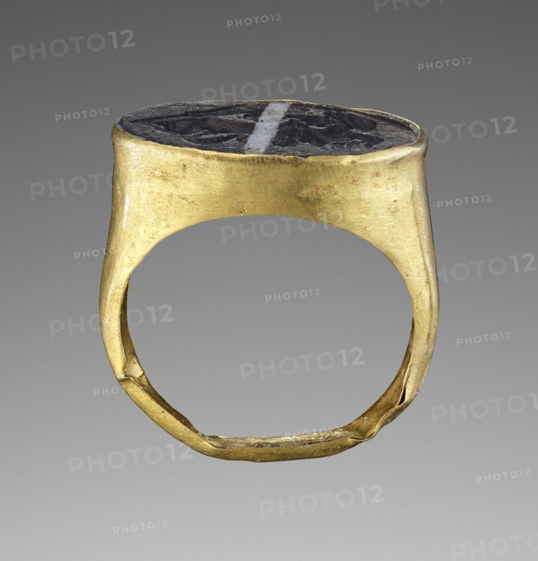 Cast Gem with Scylla attacking a Sailor set into a Ring; second half of 1st century B.C; Gem: glass; ring: gold; 1.8 × 1.3 cm